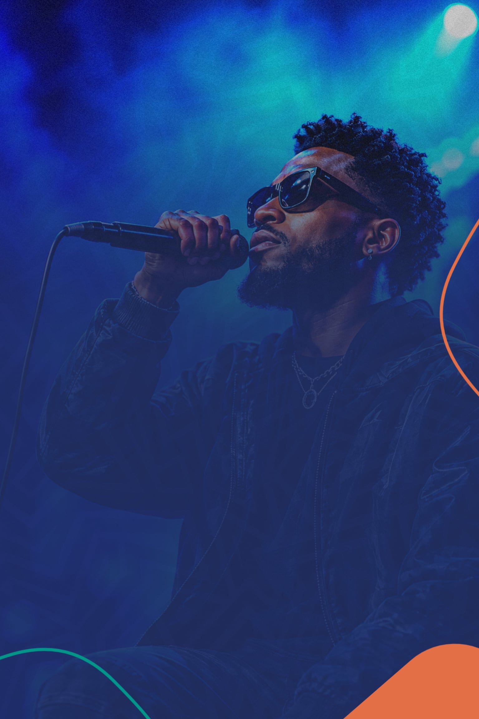 Independent African artist performing under stage lights